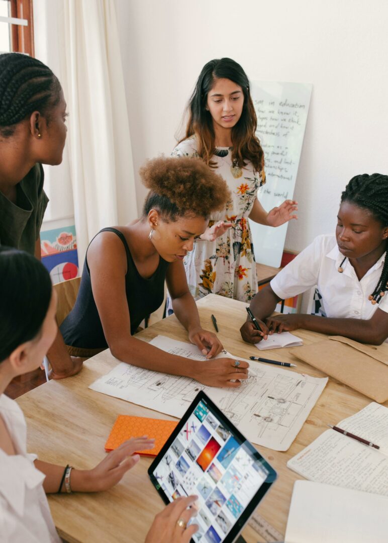 Group of people with a small business working together on a tender.